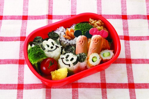 Mickey Mouse Sushi Rice Press in use