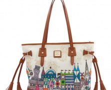 it’s a small world Disney Dooney and Bourke Tassel Bag